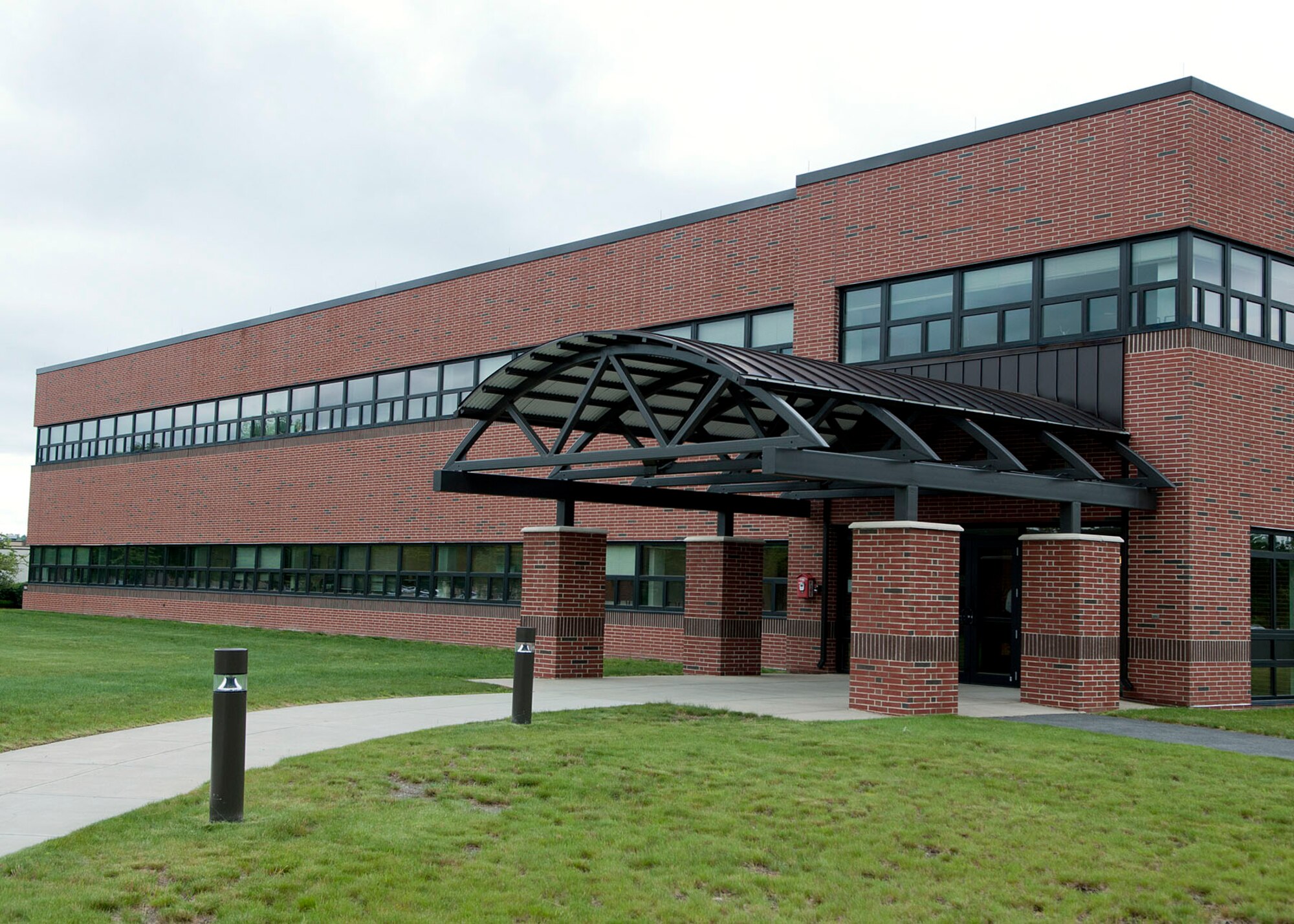 HANSCOM AIR FORCE BASE, Mass. – An exterior view of Building 1604, Hanscom’s newest office building, June 5. Base officials recently learned the building earned the U.S. Environmental Protection Agency’s ENERGY STAR certification, which signifies that the building performs in the top 25 percent of similar facilities nationwide for energy efficiency and meets strict energy efficiency performance levels set by the EPA. (U.S. Air Force photo by Mark Wyatt)