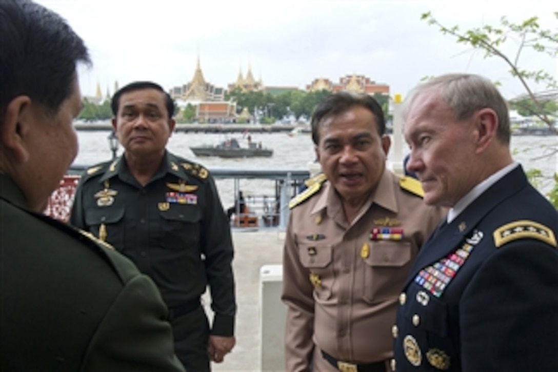Chairman of the Joint Chiefs of Staff Gen. Martin E. Dempsey talks with Thailand's Joint Chiefs during a visit to Bangkok, Thailand, on June 5, 2012.  