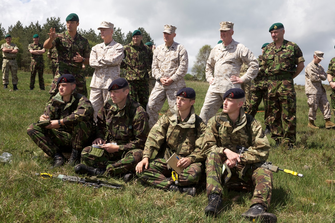 Gen. James F. Amos, the 35th Commandant of the Marine Corps, and Sgt. Maj. Micheal P. Barrett, the 17th Sergeant Major of the Marine Corps, attends British Royal Marines training at the Commando Training Centre Royal Marines in Lympstone, United Kingdom, June 6, 2012.