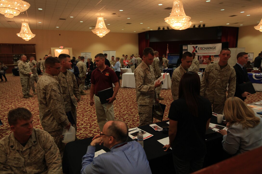 Marines, sailors and family members gather to seek job opportunities during the 2012 Hiring Hero’s Career Fair, at Camp Pendleton's Pacific Views Event Center ballroom, June 6.