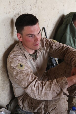 Petty Officer 3rd Class Matthew Sears, a corpsman with C Company, 1st Battalion, 8th Marines, Regimental Combat Team 6 enjoys some down time while conducting combat operations in the Gostan valley, Nimruz province, Afghanistan. Before joining the Navy, Sears was a firefighter/EMT in his hometown of Dayton, Ohio.