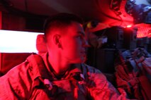 Petty Officer 3rd Class Matthew Sears, a corpsman with C Company, 1st Battalion, 8th Marines, Regimental Combat Team 6 sits inside an Mine Resistant Ambush Protected vehicle. Before joining the Navy, Sears was a firefighter/EMT in his hometown of Dayton, Ohio.