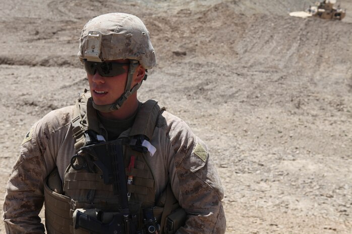 Petty Officer 3rd Class Matthew Sears, a corpsman with C Company, 1st Battalion, 8th Marines, Regimental Combat Team 6 patrols in Nimruz province, Afghanistan. Before joining the Navy, Sears was a firefighter/EMT in his hometown of Dayton, Ohio.