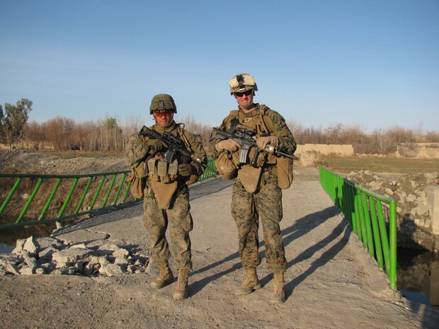 Sgt. Maj. Jamie Deets (right), Regimental Combat Team 6 sergeant major, and Sgt. Maj. Rafael Rodriguez (left), 3rd Battalion, 7th Marines sergeant major, pose for a photo in Sangin, Afghanistan.