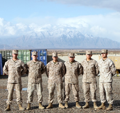 Some of the Marines with the S-1, Headquarters Company, Regimental Combat Team 6 pose for a photo aboard Forward Operating Base Delaram II.