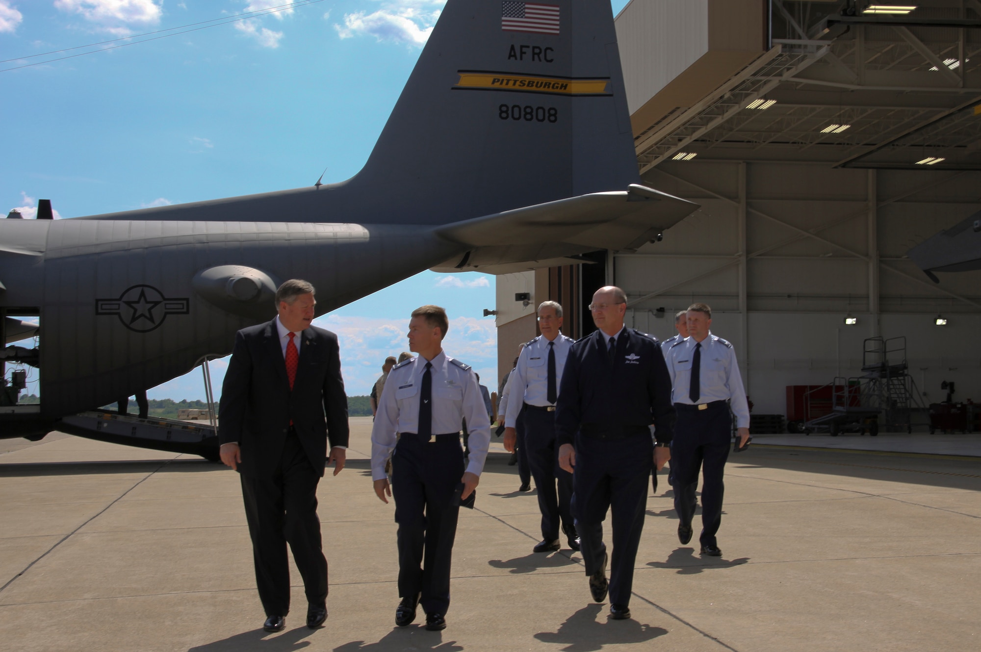 (From left) Secretary of the Air Force Michael Donley, 911th Airlift Wing Commander Col. Craig C. Peters, and Deputy to the Chief of Air Force Reserve Maj. Gen. James "JJ" Jackson depart the flightline at Pittsburgh IAP Air Reserve Station June 7, 2012, after a briefing on the 911th Airlift Wing's role and C-130 aircraft capability with regard to regional national disaster preparedness support. This was Donley's first visit to the 911th AW, which included a comprehensive base tour and meetings with Airmen, base officials and local civic leaders. (U.S. Air Force photo/Capt. Shawn M. Walleck)