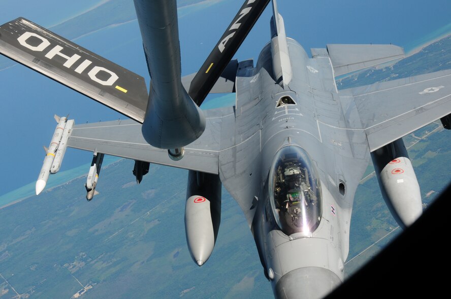 F16CM Fighting Falcons from the 180th Fighter Wing, Ohio Air National Guard soar through the skies of Mich. during an Employer Support of the Guard and Reserve Bosslift June 7, 2012.  The 180th FW and the 121st Air Refueling Wing also of the Ohio Air National Guard teamed up to Support the Northwest Ohio ESGR organization to give civilian employers of service members a chance to see what their employees do when performing their military duties. ESGR facilitates and promotes a cooperative culture of employer support for National Guard and Reserve Service by developing and advocating mutually beneficial initiatives between employers and their Service members and acting as the employer’s principal advocate within the Department of Defense. (U.S. Air Force photo by Senior Airman Amber Williams/Released)