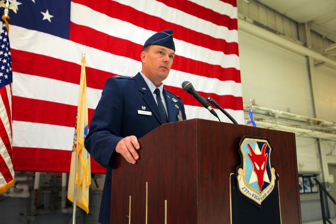 Incoming 177th Fighter Wing Maintenance Group commander Col. Patrick M. Kennedy, addresses dignitaries, Airmen, friends and family members during the Change of Command ceremony April 22, 2012.  The 177th Fighter Wing, New Jersey Air National Guard, is located at Egg Harbor Township, N.J.  U.S. Air Force photo by Master Sgt. Mark C. Olsen