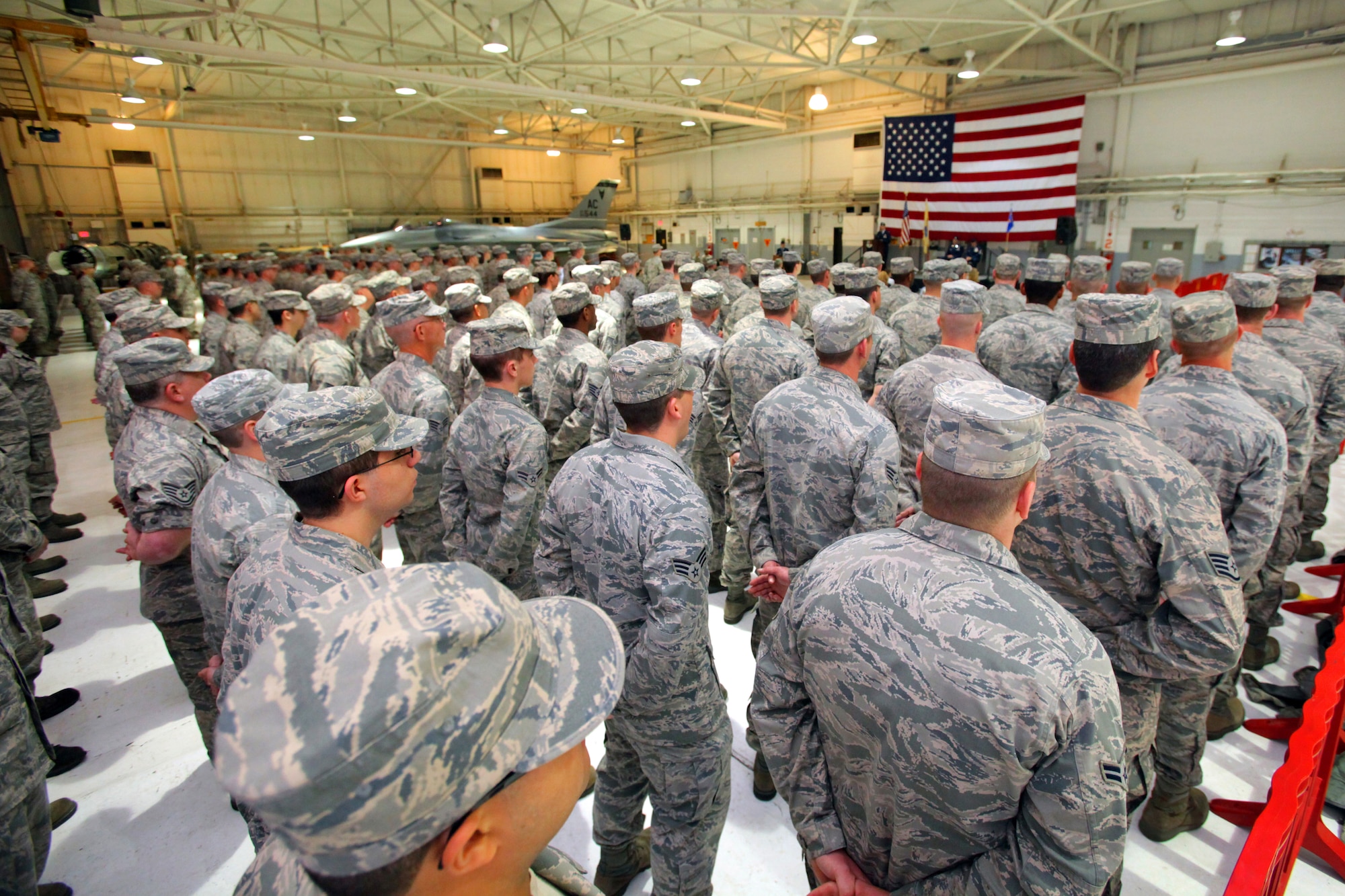 A picture of Airmen of the 177th Fighter Wing Maintenance Group standing at parade rest.