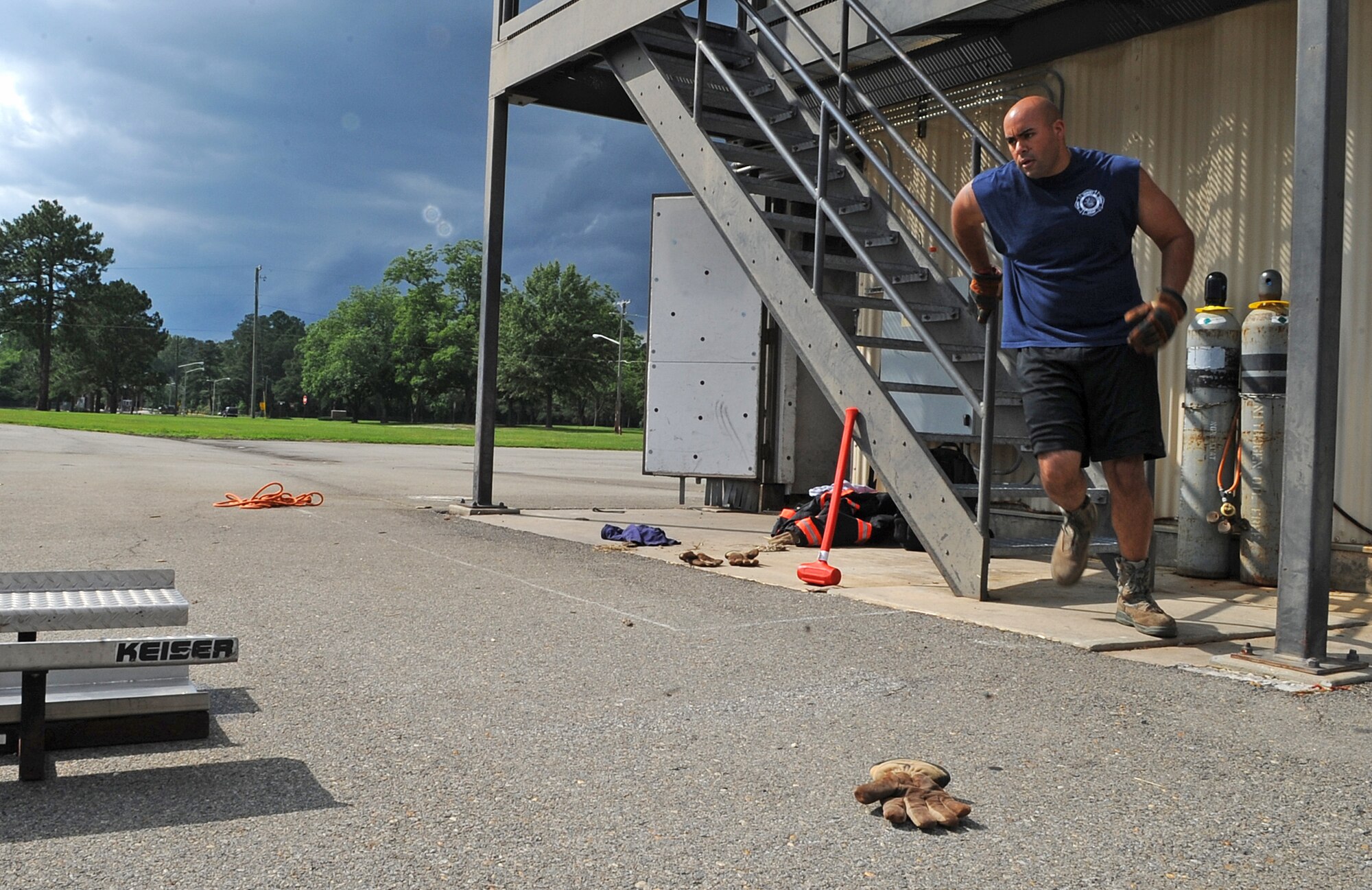 U.S. Air Force Staff Sgt. Roger Kemp completes a practice run for a firefighter combat challenge on Seymour Johnson Air Force Base, N.C., June 5, 2012. Kemp, along with other 4th Civil Engineer Squadron firefighters, practice the same tasks repeatedly to build endurance. Kemp, 4th CES fire protection crew chief, is a native of Chicago. (U.S. Air Force photo/Airman 1st Class Aubrey Robinson/Released)