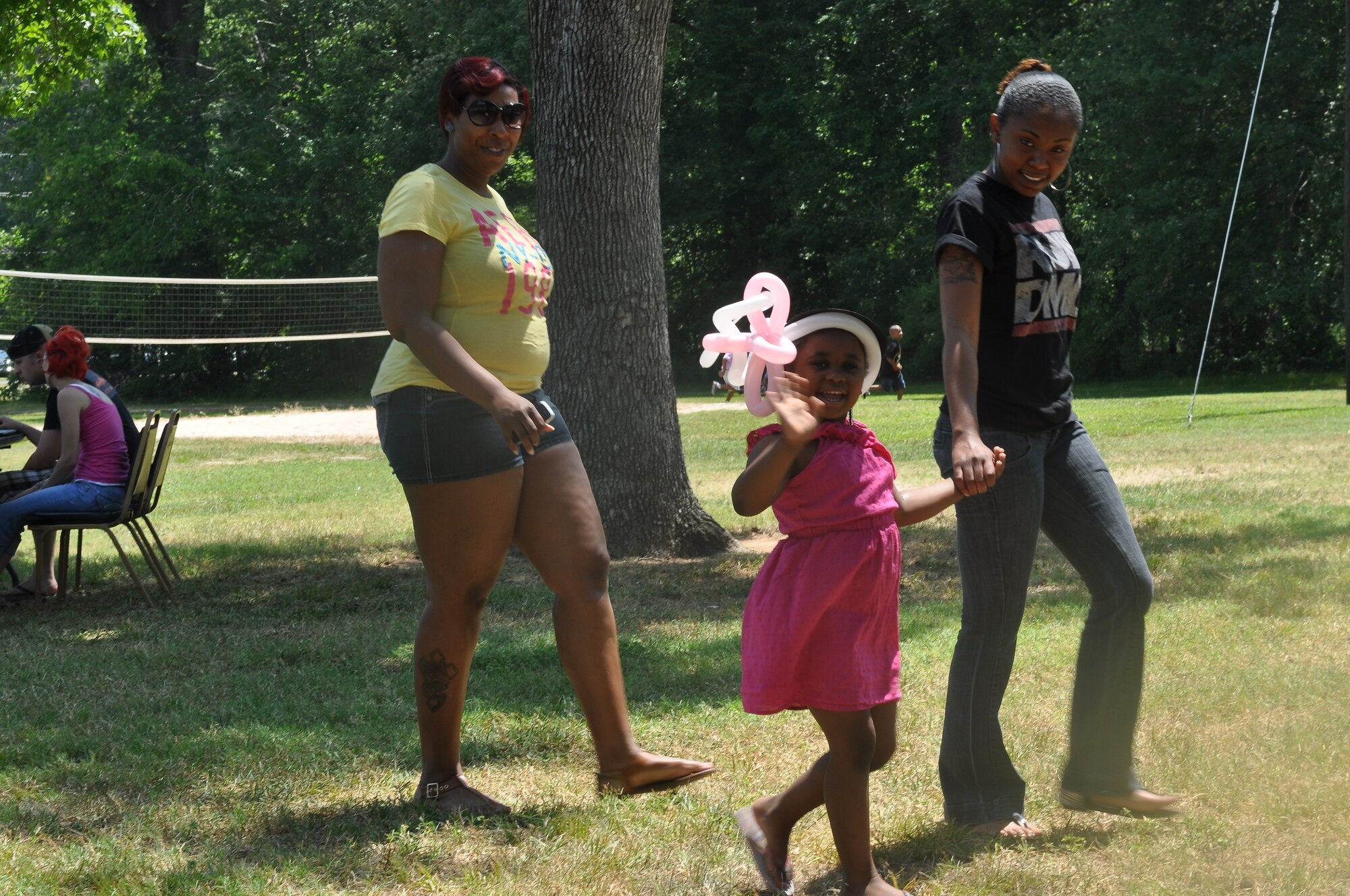 Some attendees at the 307th Bomb Wing/917th Fighter Group Family Day enjoy the festivities at Cullen Park on Barksdale Air Force Base, La., June 2, 2012. The annual event is an opportunity for the Reservists and their families to get together for some fun and camaraderie. (U.S. Air Force photo/Betty Stephens)