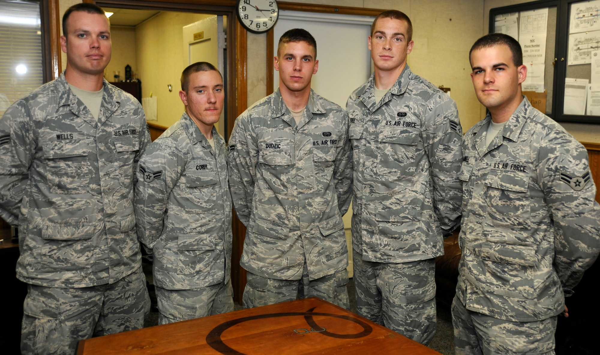 Members of the 744th Communications Squadron's Airman Motivation Program (AMP) pose for a photo May 9 inside Building 1539 here. AMP encourages Andrews' base populous to seek self improvement through activities that foster teamwork, physical fitness and unit camaraderie. (U.S. Air Force photo/Senior Airman Lindsey A. Porter)
