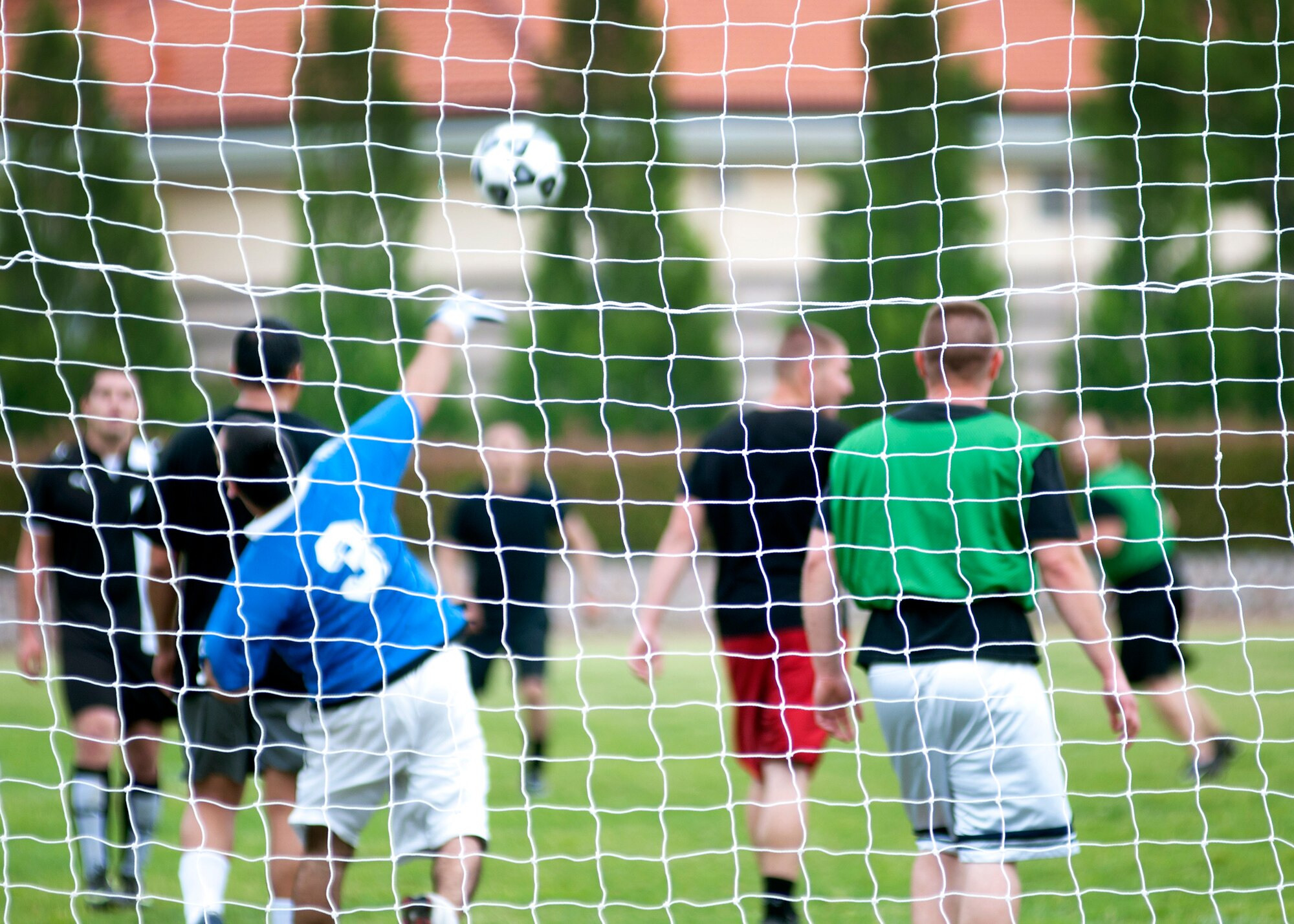 Members of the 31st Logistics Readiness Squadron compete in a soccer tournament during a 31st Fighter Wing sports day June 1 at Aviano Air Base, Italy. More than 950 Team Aviano members proved victorious throughout the sports day tournaments held at the Dragon Fitness Center in which the 31st Civil Engineer Squadron emerged as the top overall unit. (U.S. Air Force photo/ Airman 1st Class Briana Jones)
