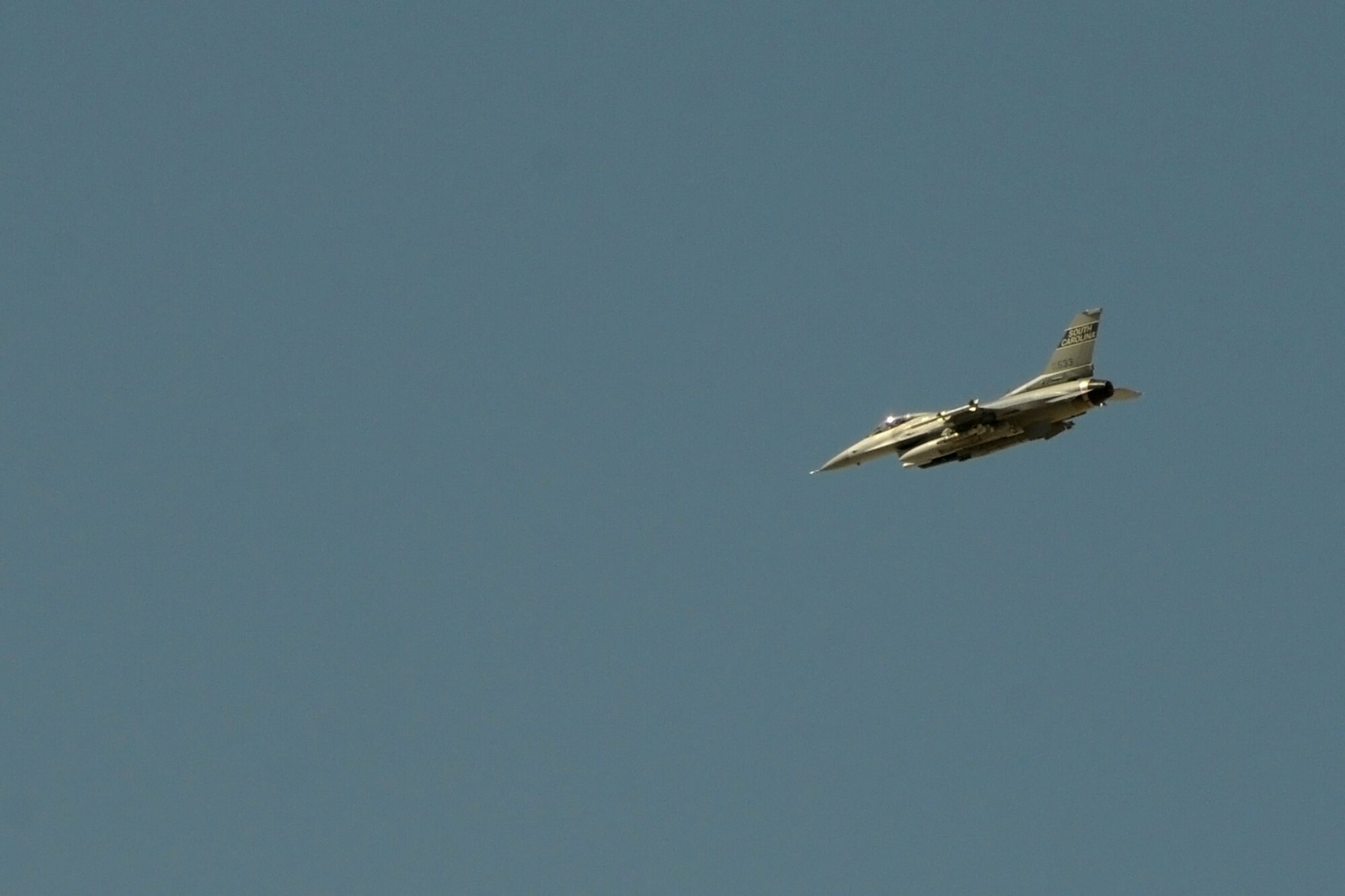 Lieutenant Colonel Scott Bridgers, a fighter pilot assigned to the 157th Expeditionary Fighter Squadron at Kandahar Airfield, Afghanistan, returns after flying a mission and reaching his 4,000th F-16 Fighting Falcon flying hour June 2, 2012. Lt. Col. Bridgers is the third fighter pilot to have achieved that level of flying from McEntire Joint National Guard Base, S.C.. Swamp Fox F-16's, pilots, and support personnel began their Air Expeditionary Force deployment early April to take over flying missions for the air tasking order and provide close air support for troops on the ground in Afghanistan in support of Operation Enduring Freedom.
(U.S. Air Force photo/TSgt. Caycee Cook)
