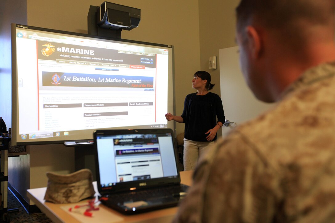 Elizabeth Carty, a family readiness program trainer, instructs a class during an eMARINE training course at a Marine Corps Family Team Building classroom, June 7. The eMARINE website provides secure, readiness information to military members and those who support them.
