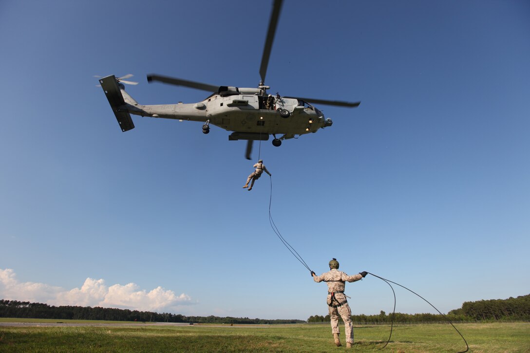 Marines with 3rd Marine Special Operations Battalion, U.S. Marine Corps Forces, Special Operations Command, conduct predeployment training in Savannah, Ga., May 23. During the training the Marines conducted helocasting drills. 