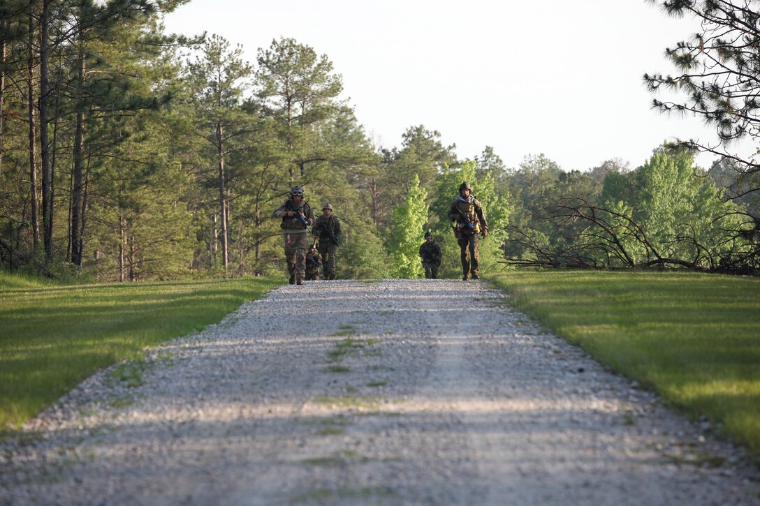 Marines with 3d Marine Special Operations Battalion, U.S. Marine Corps Forces, Special Operations Command, conduct predeployment training in South Carolina., May 22 to 24. During the training the Marines conducted counterinsurgency (COIN) operations.