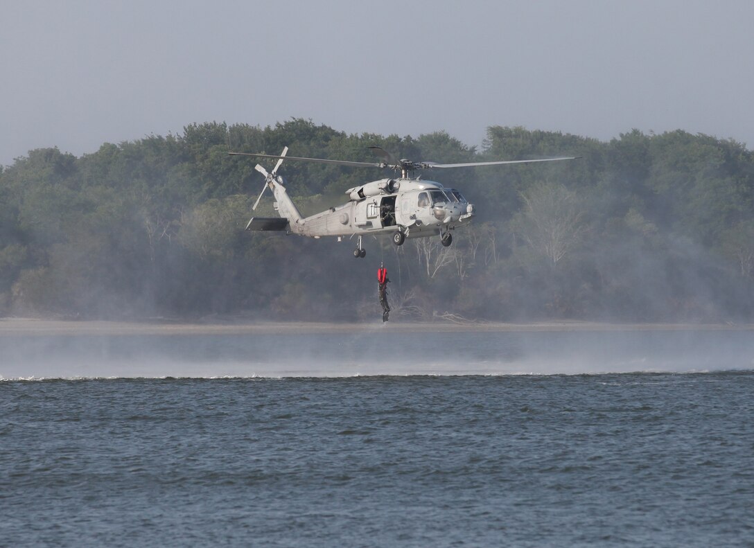 Marines with 3d Marine Special Operations Battalion, U.S. Marine Corps Forces, Special Operations Command, conduct predeployment training in Savannah, Ga., May 23. During the training the Marines conducted helocasting drills. 