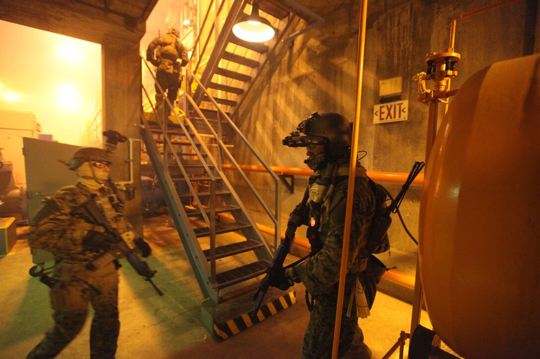 Marines with 3d Marine Special Operations Battalion, U.S. Marine Corps Forces, Special Operations Command, conduct predeployment training in South Carolina., May 22 to 24. During the training the Marines conducted counterinsurgency (COIN) operations.