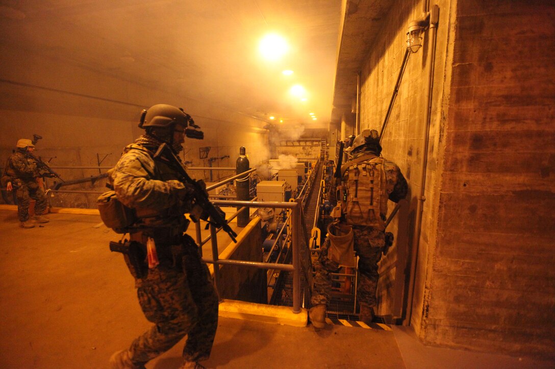 Marines with 3d Marine Special Operations Battalion, U.S. Marine Corps Forces, Special Operations Command, conduct predeployment training in South Carolina., May 22 to 24. During the training the Marines conducted counterinsurgency (COIN) operations.