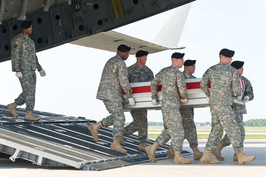 A U.S. Army carry team transfers the remains of Army Capt. Scott P. Pace, of Brawley, Calif., at Dover Air Force Base, Del., June 8, 2012. Pace was assigned to the 1st Squadron, 17th Cavalry Regiment, 82nd Combat Aviation Brigade, 82nd Airborne Division, Fort Bragg, N.C. (U.S. Air Force photo/Roland Balik)