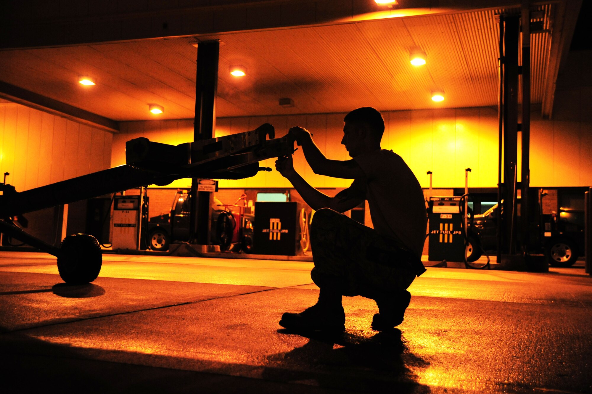 WHITEMAN AIR FORCE BASE, Mo. -- Senior Airman John McLaughlin, 509th MXS Aerospace Ground Equipment journeyman, replaces pins on a MD-1 towbar May 31, 2012. Airmen like McLaughlin are responsible for maintaining the equipment that supplies electricity, hydraulic pressure and air pressure, as planes receive maintenance and prepare for flight. (U.S. Air Force photo/Senior Airman Nick Wilson) (Released)