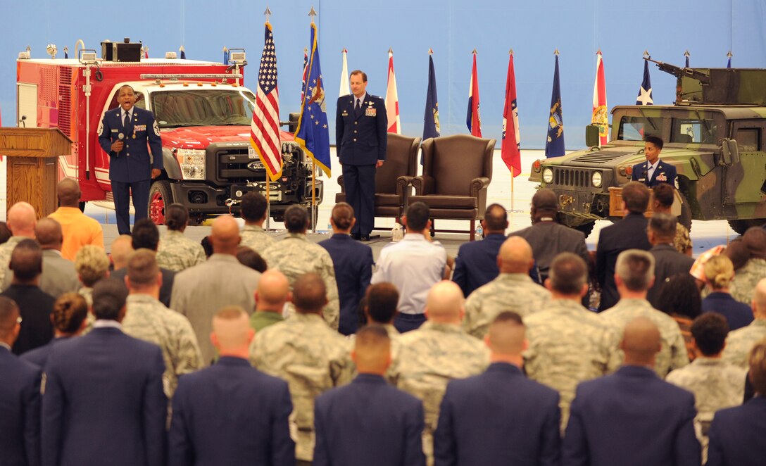 Chief Master Sgt. Anthony Brinkley, 11th Wing/Joint Base Andrews command chief, leads the audience in the Airman's Creed during his retirement ceremony June 8, 2012. Brinkley served more than 28 years in the Air Force, many of which were as a First Sergeant.  (U.S. Air Force Photo by Staff Sgt. Torey Griffith)