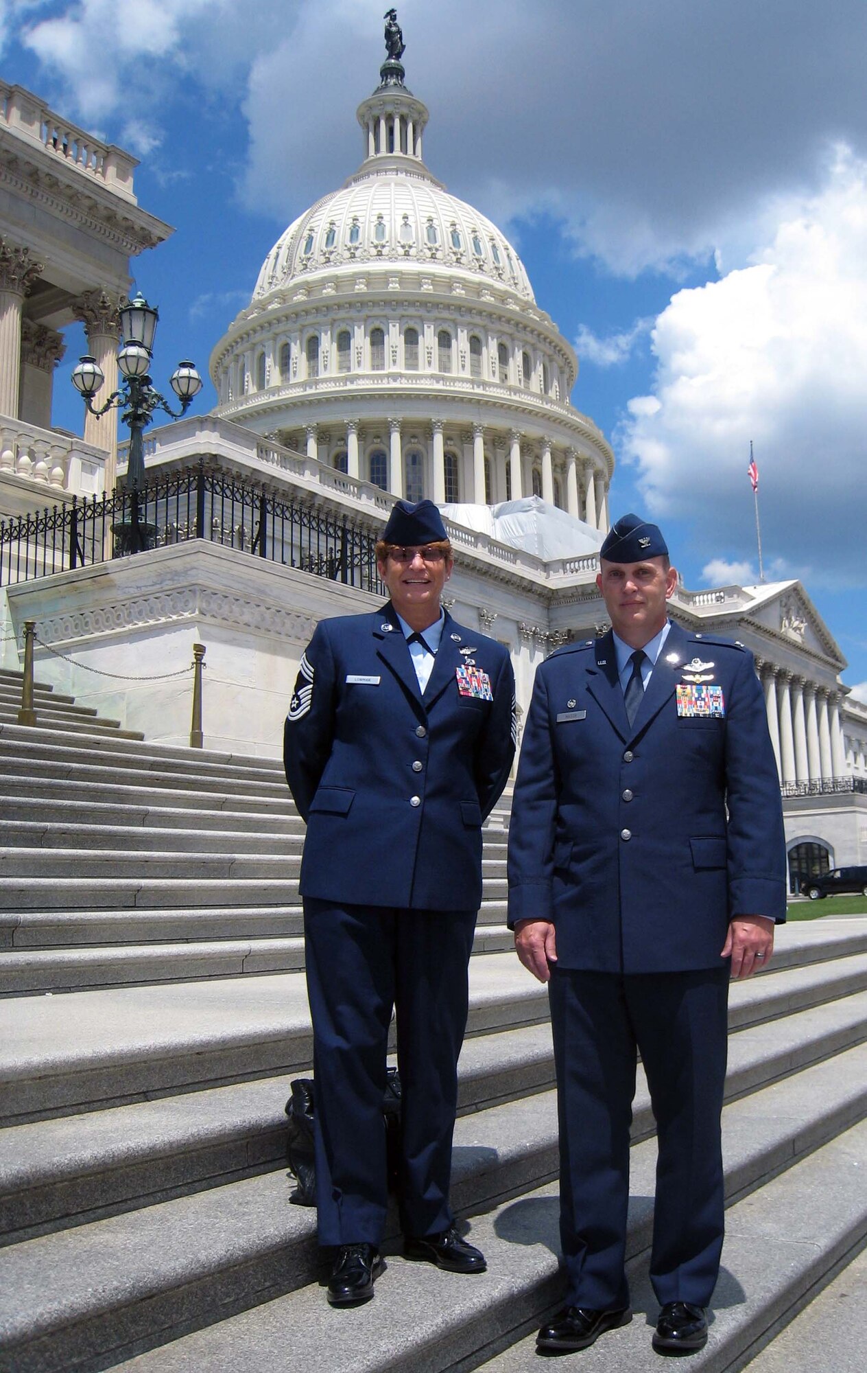 Col. William H. Mason, commander of the 931st Air Refueling Group, McConnell Air Force Base, Kan., and Chief Master Sgt. Kathleen E. Lowman, acting group superintendent, stand in front of the U.S. Capitol building in Washington, D.C., June 7, 2012.  Mason and Lowman spent a week in Washington conducting visits with congressional members and staff from the state of Kansas.  During the visits, Mason and Lowman discussed the important role and mission of the Air Force Reserve, updated the congressional members on the recent accomplishments and activities of the 931st, and provided an overview of future plans for the Group.  (U.S. Air Force photo by 1st Lt. Zach Anderson)