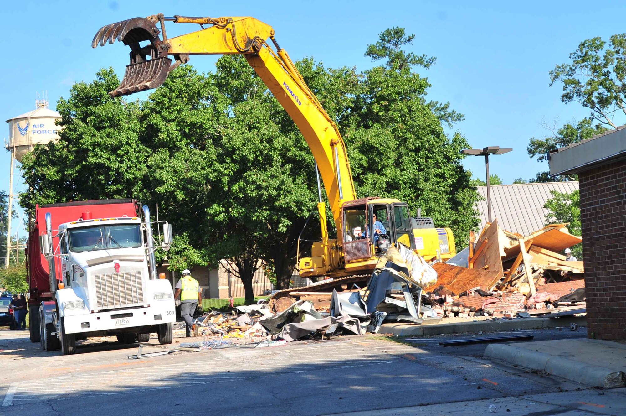 An abandoned Burger King is torn down to prepare for green space, Shaw Air Force Base, S.C., June 8, 2012. The new Burger King relocated to the food court inside the new Exchange. (U.S. Air Force photo by Airman 1st Class Ashley L. Gardner/ Released)
