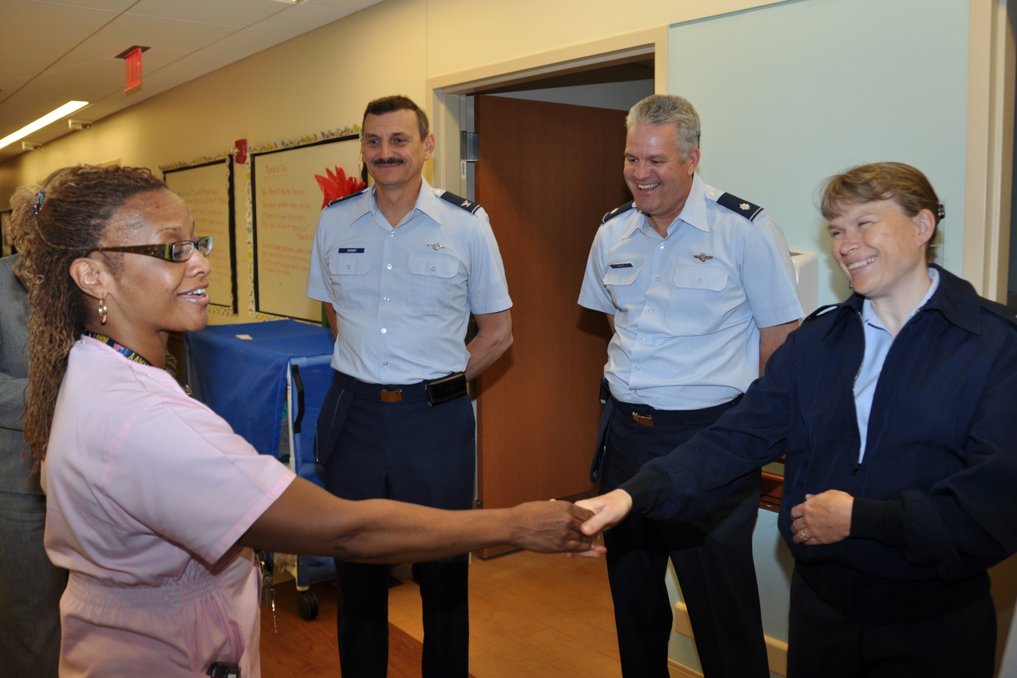 LOUIS STOKES CLEVELAND VA MEDICAL CENTER, Ohio – Lt. Col. Stephanie Welhouse, 910th Force Support Squadron commander, meets Angela Brazile, Medical Center nurse, while touring the Louis Stokes Cleveland VA Medical Center June 4, 2012. The Cleveland VA is a multi-specialty outpatient clinic and vet center that includes specialized programs such as blind rehabilitation, polytrauma care, invasive cardiology, post-traumatic stress disorders, comprehensive cancer center and several other areas of expertise. (U.S. Air Force photo by Staff Sgt. Megan Tomkins)