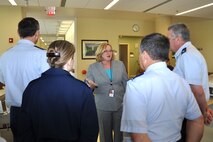 LOUIS STOKES CLEVELAND VA MEDICAL CENTER, Ohio – Susan Fuehrer, Louis Stokes Cleveland VA Medical Center director, explains the benefits for veterans during the medical center tour to Airmen of Youngstown Air Reserve Station June 4, 2012, in Cleveland, Ohio. The Cleveland VA is a multi-specialty outpatient clinic and vet center that includes specialized programs such as blind rehabilitation, polytrauma care, invasive cardiology, post-traumatic stress disorders, comprehensive cancer center and several other areas of expertise. (U.S. Air Force photo by Staff Sgt. Megan Tomkins)