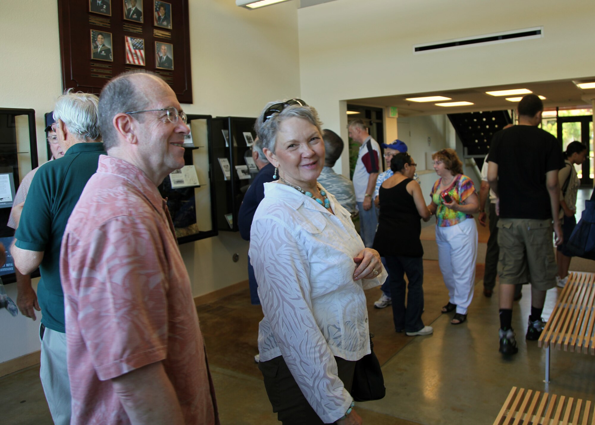 TRAVIS AIR FORCE BASE, Calif. -- Former 349th Air Mobility Wing Commander, Brig. Gen. Thomas M. Gisler, Jr., who was here Sept. 2006 - Jan. 2008, and his wife Cleo, check out the displays in the Heritage Hall in the Wing Headquarters during Alumni Day, June 2, 2012.  The day's events also included a BBQ lunch sponsored by the 349th Chiefs Group, the 349th Officer's Spouses Club and Mr. Stanley Davis; and a static display tour of a C-17 Globemaster III.  The day's festivities cumulated with a banquet featuring remarks by Brig. Gen. Dale R. Baumler, former 349 AMW and 14th Air Force commander; and by Brig. Gen. John C. Flournoy, Jr., current 349 AMW commander; and music by the Band of the Golden West. (U.S. Air Force photo / Lt. Col. Robert Couse-Baker)