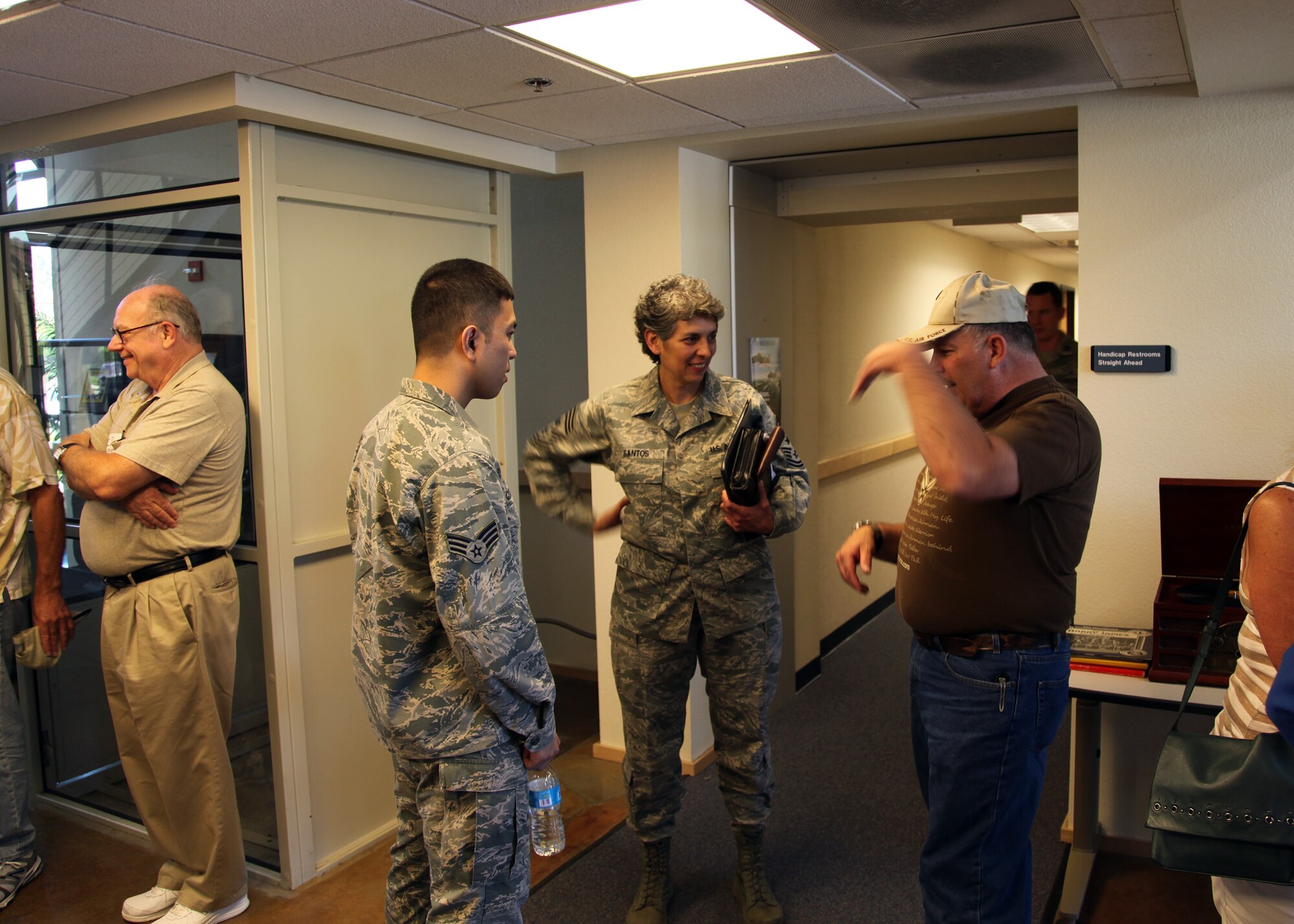 TRAVIS AIR FORCE BASE, Calif. -- Current and past members of the 349th Air Mobility Wing reinforced the wing's proud heritage and commitment to excellence during Alumni Day, June 2, 2012 at Travis Air Force Base, Calif.  The day's events included the ribbon cutting ceremony for the Heritage Hall in the Wing Headquarters; a BBQ lunch sponsored by the 349th Chiefs Group, the 349th Officer's Spouses Club and Mr. Stanley Davis; and a static display tour of a C-17 Globemaster III.  The day's festivities cumulated with a banquet featuring remarks by Brig. Gen. Dale R. Baumler, former 349 AMW and 14th Air Force commander; and by Brig. Gen. John C. Flournoy, Jr., current 349 AMW commander; and music by the Band of the Golden West. (U.S. Air Force photo / Lt. Col. Robert Couse-Baker)