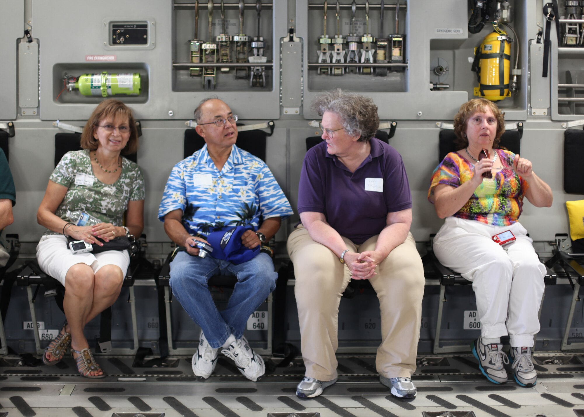 TRAVIS AIR FORCE BASE, Calif. --Current and past members of the 349th Air Mobility Wing reinforced the wing's proud heritage and commitment to excellence during Alumni Day, June 2, 2012 at Travis Air Force Base, Calif.  The day's events included the ribbon cutting ceremony for the Heritage Hall in the Wing Headquarters; a BBQ lunch sponsored by the 349th Chiefs Group, the 349th Officer's Spouses Club and Mr. Stanley Davis; and a static display tour of a C-17 Globemaster III.  The day's festivities cumulated with a banquet featuring remarks by Brig. Gen. Dale R. Baumler, former 349 AMW and 14th Air Force commander; and by Brig. Gen. John C. Flournoy, Jr., current 349 AMW commander; and music by the Band of the Golden West. (U.S. Air Force photo / Lt. Col. Robert Couse-Baker)