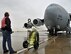 Jack Iman, transient alert aircraft servicer, mans the fire extinguisher as a March Air Force Base C-17 Globemaster III starts its engines Monday on the Travis flightline. (U.S. Air Force photo/Airman 1st Class Madelyn Ottem)