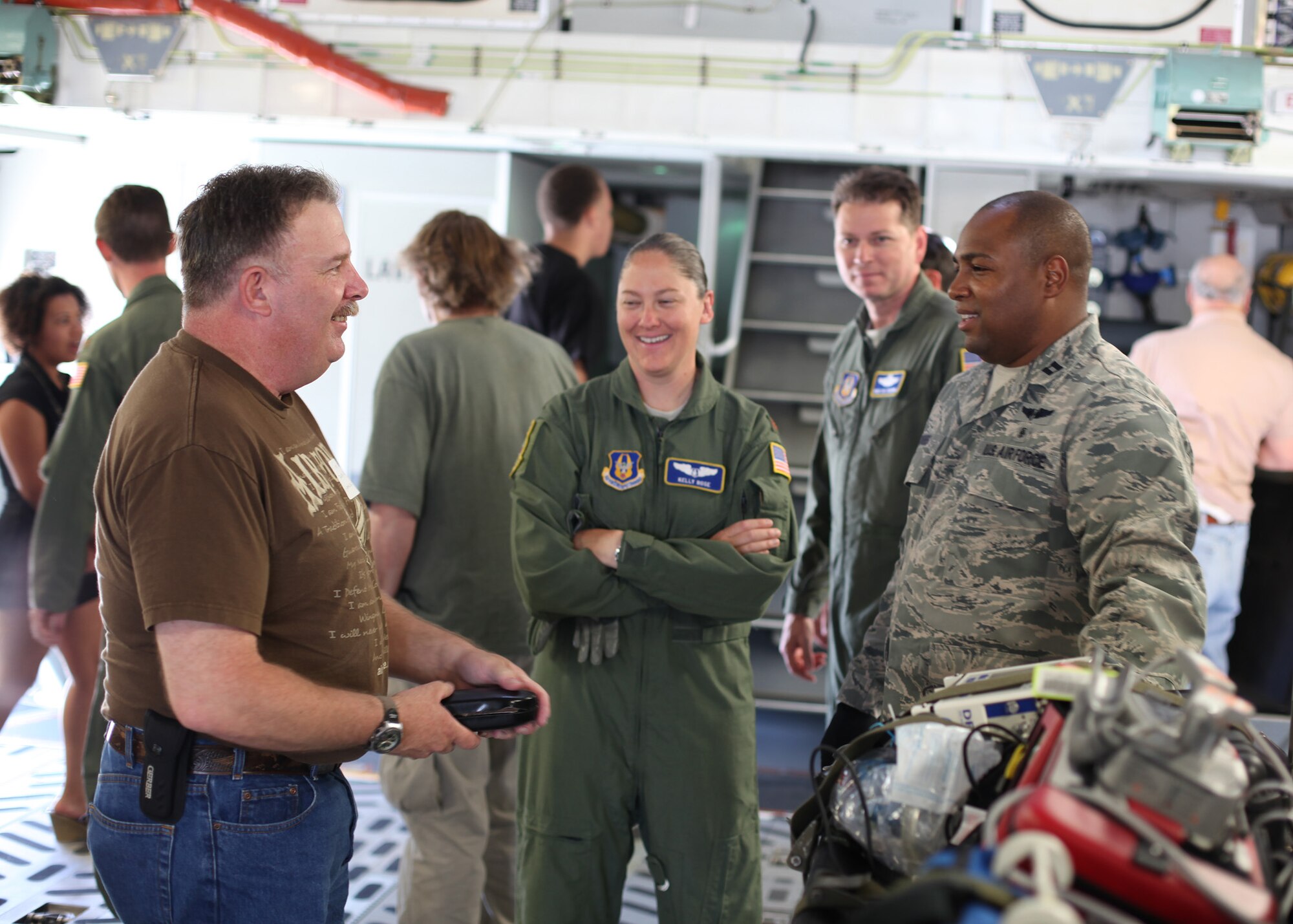 TRAVIS AIR FORCE BASE, Calif. --Current and past members of the 349th Air Mobility Wing reinforced the wing's proud heritage and commitment to excellence during Alumni Day, June 2, 2012 at Travis Air Force Base, Calif.  The day's events included the ribbon cutting ceremony for the Heritage Hall in the Wing Headquarters; a BBQ lunch sponsored by the 349th Chiefs Group, the 349th Officer's Spouses Club and Mr. Stanley Davis; and a static display tour of a C-17 Globemaster III.  The day's festivities cumulated with a banquet featuring remarks by Brig. Gen. Dale R. Baumler, former 349 AMW and 14th Air Force commander; and by Brig. Gen. John C. Flournoy, Jr., current 349 AMW commander; and music by the Band of the Golden West. (U.S. Air Force photo / Lt. Col. Robert Couse-Baker)