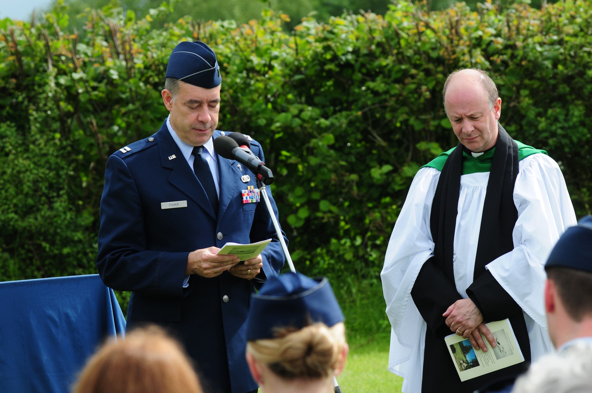 GARVESTON, England - Capt. Joseph Fisher, 48th Fighter Wing chaplain, speaks before the unveiling of the Garveston Memorial June 6, 2012.  On June 4, 1944 an Army Air Corps B-24 Liberator Bomber crashed near the village, killing 10 crew members and two firemen. The memorial was dedicated by a committee formed by those who witnessed the crash over 60 years ago. (U.S. Air Force photo by Airman 1st Class Cory D. Payne)