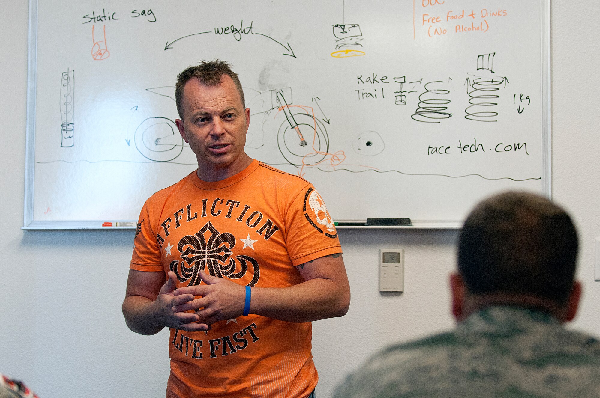 Tech. Sgt. Christopher Laubin, 90th Operations Group, goes over the physics of sportbike riding during the lecture portion of the first Military Sportbike Rider Course offered by the 90th Missile Wing traffic safety office May 30, at F. E. Warren Air Force Base, Wyo. Air Force Global Strike Command requires active-duty sportbike riders to attend a MSRC in addition to the basic riders course all motorcycle riders go through. (U.S. Air Force photo by R.J. Oriez)