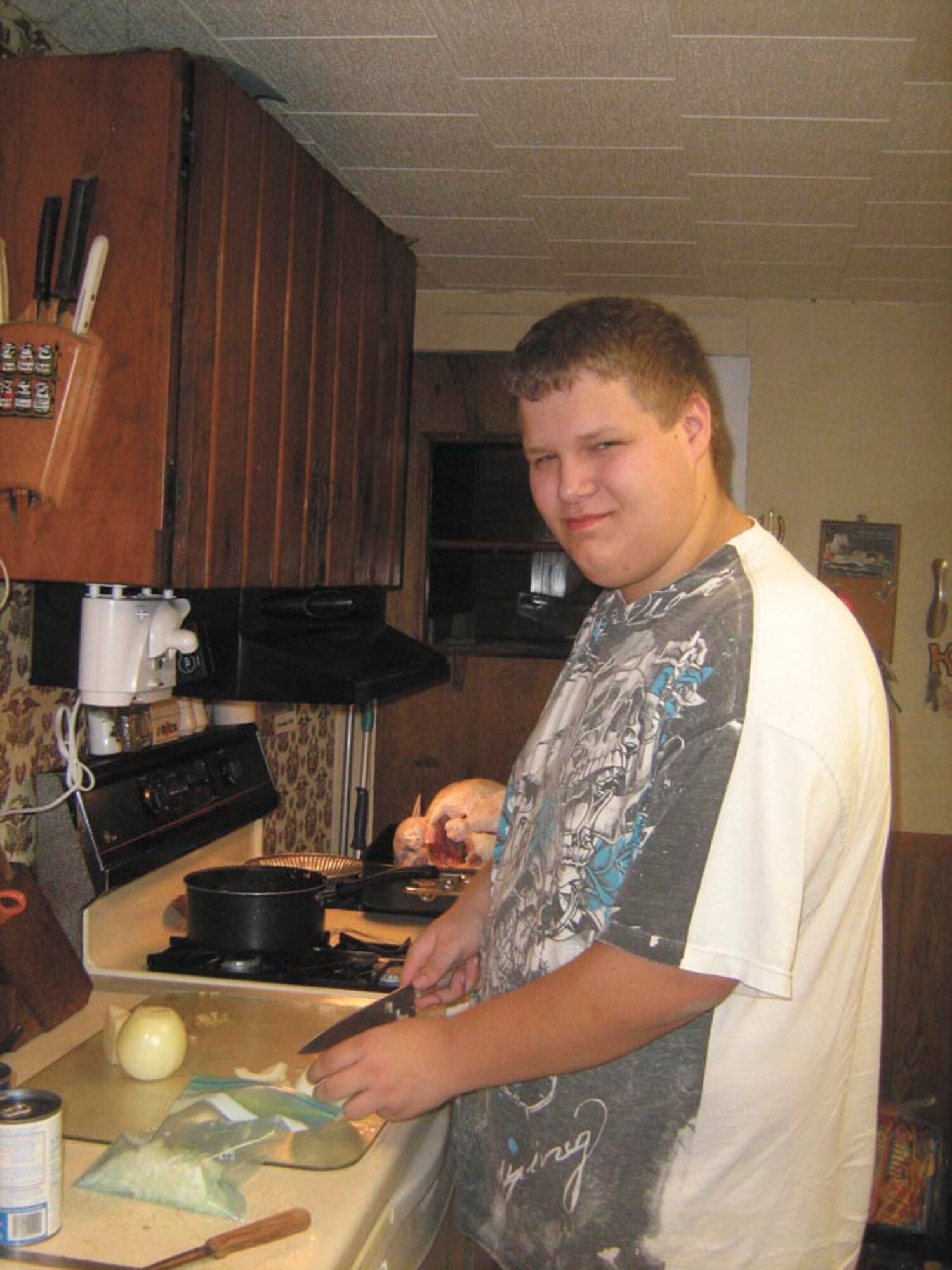 Consuming about 1,200 calories a day, Mitchell Imlah prepares a meal Oct. 23, 2010 at his home in Minocqua, Wisc. (Courtesy photo)