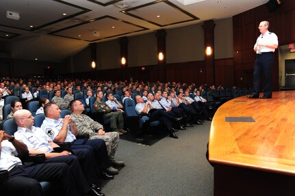 Lt. Gen. Mark Ramsay, 18th Air Force commander, speaks to Airmen at the JB Charleston theater June 4, 2012. Ramsay visited JB Charleston to get a first-hand look at the military functions that are unique to this base. (U.S. Air Force photo/Staff Sgt. Katie Gieratz) 