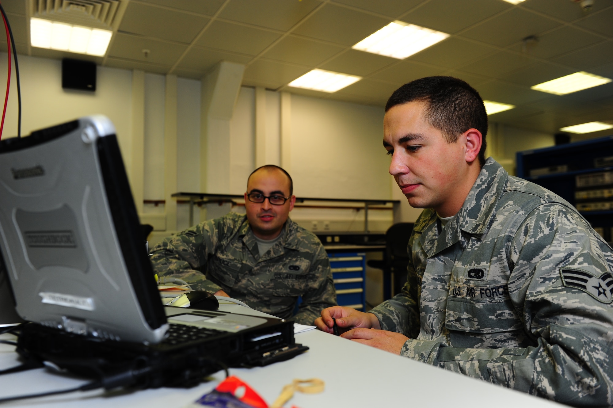 Senior Airman Troy Tetreault and Airman 1st Class Nathaniel Bruce, 86th Maintenance Squadron Test Measurement and Diagnostic Equipment journeymen, calibrate a peak power meter on Ramstein Air Base, Germany, June 5, 2012. The meter measures radar and wireless systems frequencies in high resolution. The laboratory currently supports 13,842 items in their area of responsibility and on average, calibrates, troubleshoots, and repairs more than 1,000 items monthly. (U.S. Air Force photo/Airman Basic Brea Miller)