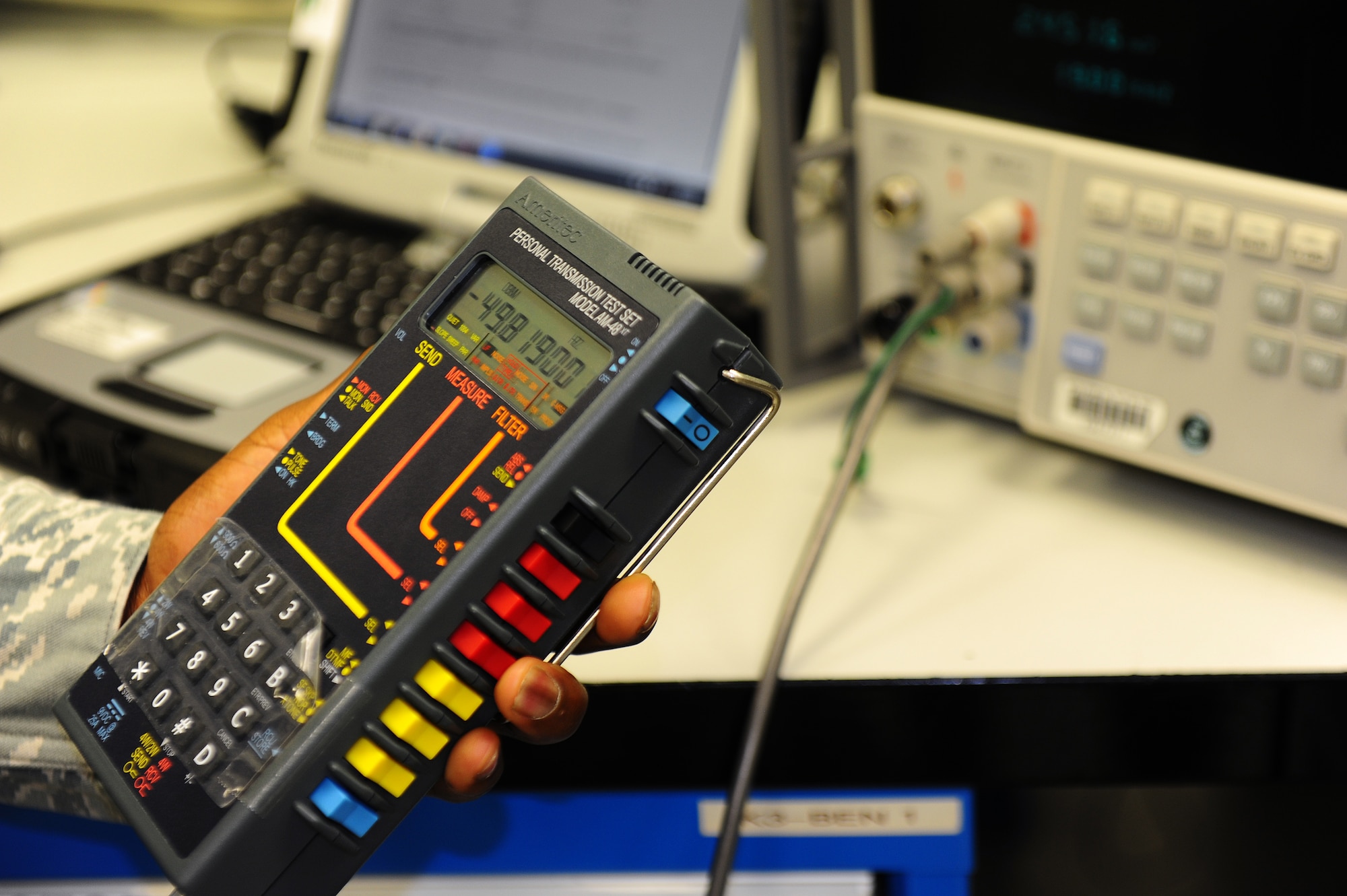 Senior Airman Terrell Singleton, 86th Maintenance SquadronTest Measurement and Diagnostic Equipment journeyman, calibrates an AM-48XT Ameritec VF Transmission Test Set on Ramstein Air Base, Germany, June 5, 2012. This transmission test set is the world's smallest full function voice and data transmission test set. The laboratory currently supports 13,842 items in their area of responsibility and on average, calibrates, troubleshoots, and repairs more than 1,000 items monthly. (U.S. Air Force photo/Brea Miller)