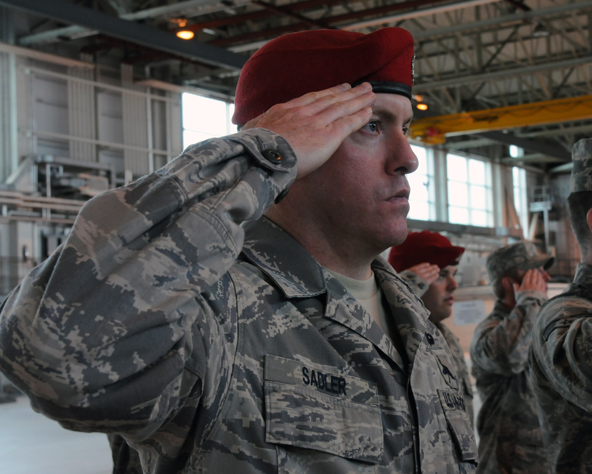 Senior Master Sgt. Duane Sadler, 321st Special Tactics Squadron combat controller, renders a final salute to Lt. Col. Jason Daniels, 321st STS commander, during his change-of-command ceremony at RAF Mildenhall June 8, 2012. Daniels departed and Maj. Travis Woodworth assumed command. (U.S. Air Force photo/Master Sgt. Kevin Wallace)