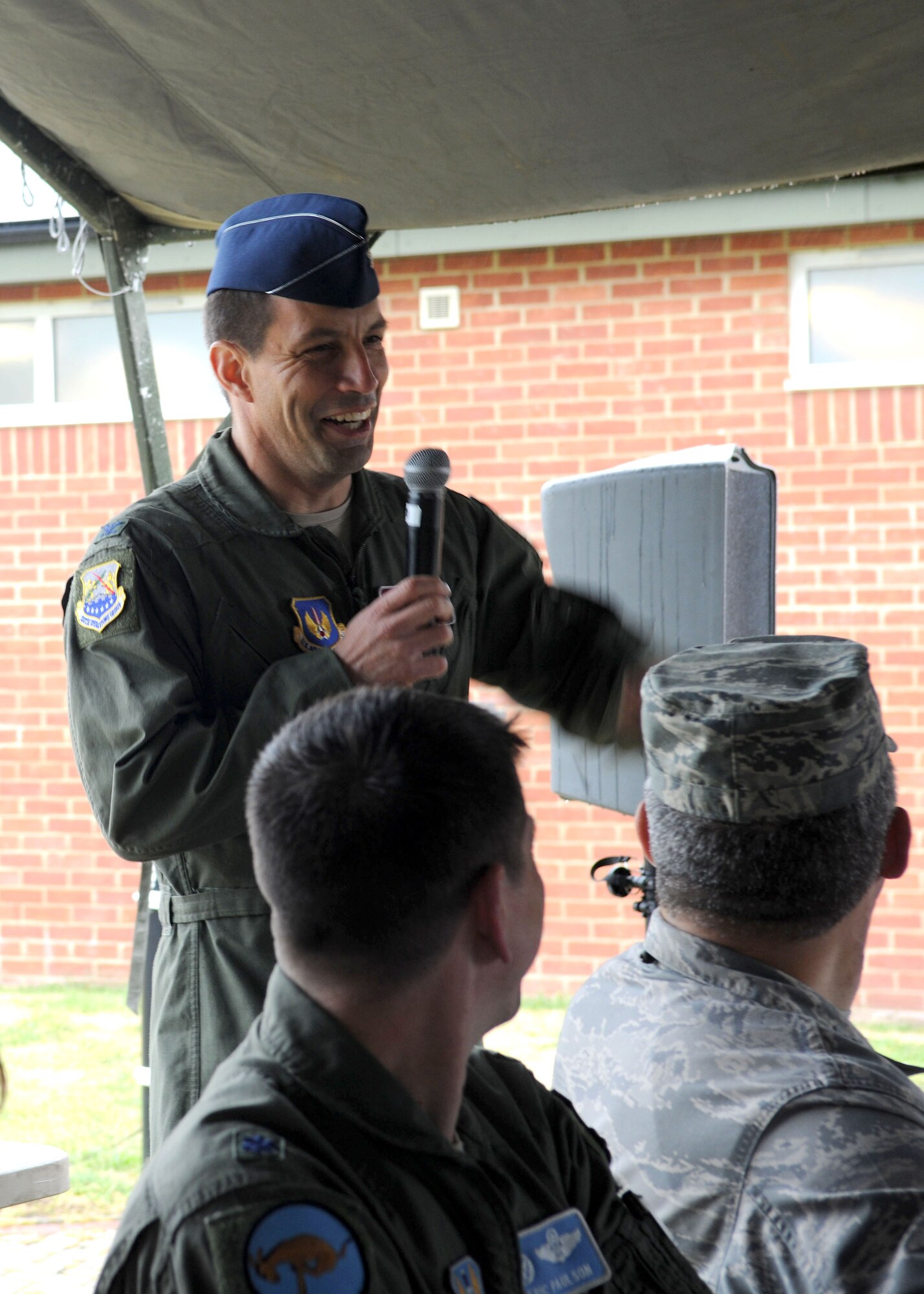 RAF MILDENHALL, England – Col. Christopher Kulas, 100th Air Refueling Wing commander, speaks during the third annual key spouses Appreciation picnic at Heritage Park here June 1, 2012.  Hosted by the Wing Commander, the picnic was held to show appreciation and give thanks to the key spouses for their support of Team Mildenhall. (U.S. Air Force photo/Toni Dineen) 