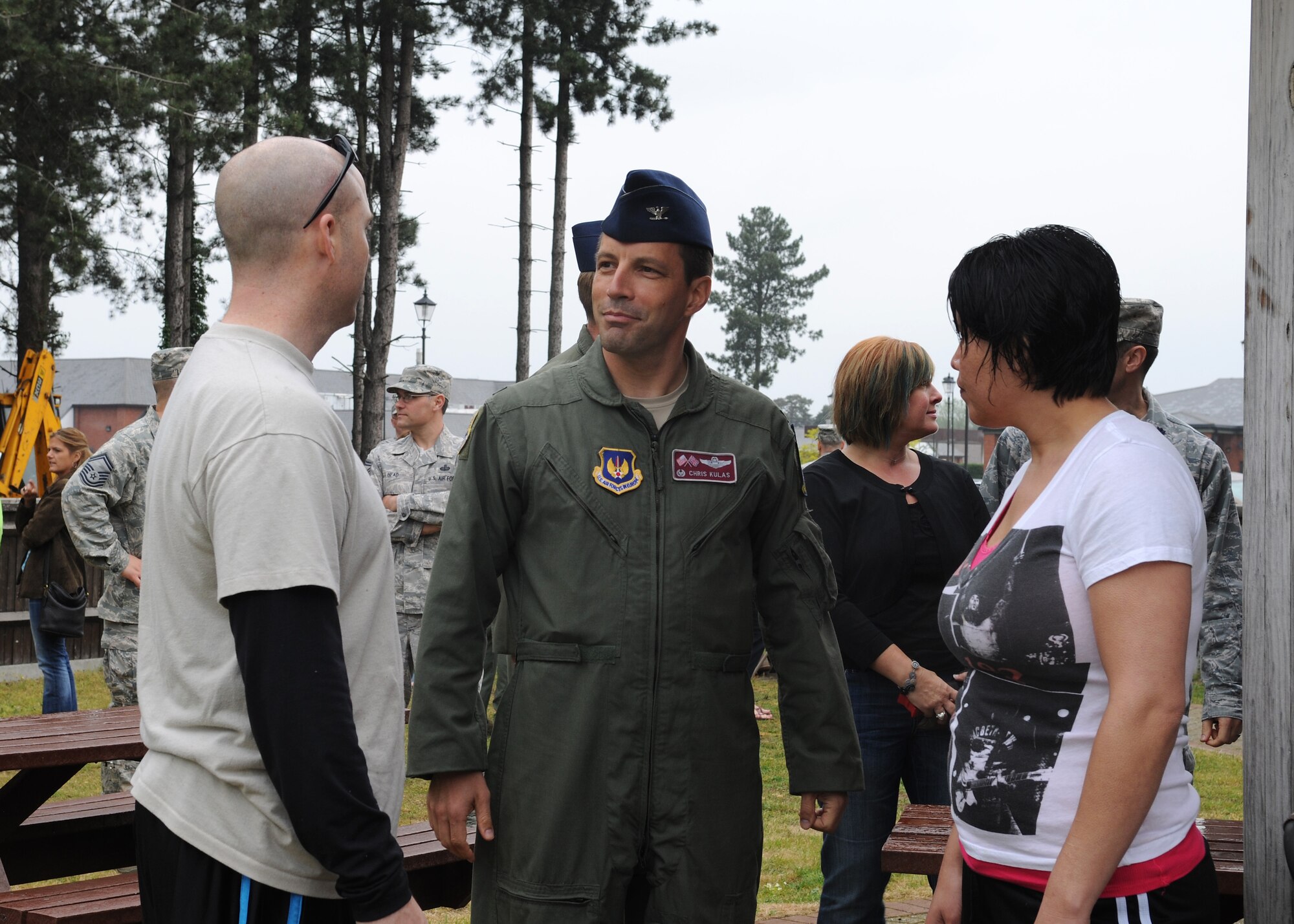 RAF MILDENHALL, England – Col. Christopher Kulas, 100th Air Refueling Wing commander, speaks to Master Sgt. Tom Wagner, 100th Maintenance Squadron first sergeant and his wife Cat, during the third annual Key Spouses Appreciation picnic at Heritage Park here June 1, 2012.  Twenty Airmen from various squadrons on RAF Mildenhall volunteered at the event held to show appreciation and to thank Team Mildenhall key spouses for their support. (U.S. Air Force photo/Toni Dineen) 