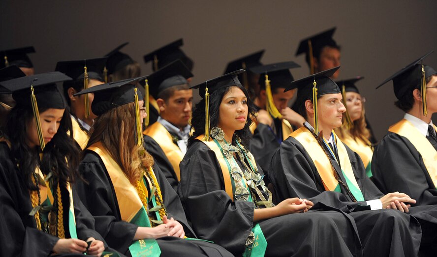 Edgren High School graduates listen to words of encouragement during their graduation ceremony at the Misawa Civic Center in Misawa City, Japan, June 8, 2012. This year's graduating class motto is "The world isn't ending, we're just taking over." (U.S. Air Force photo by Airman Kenna Jackson/Released)

