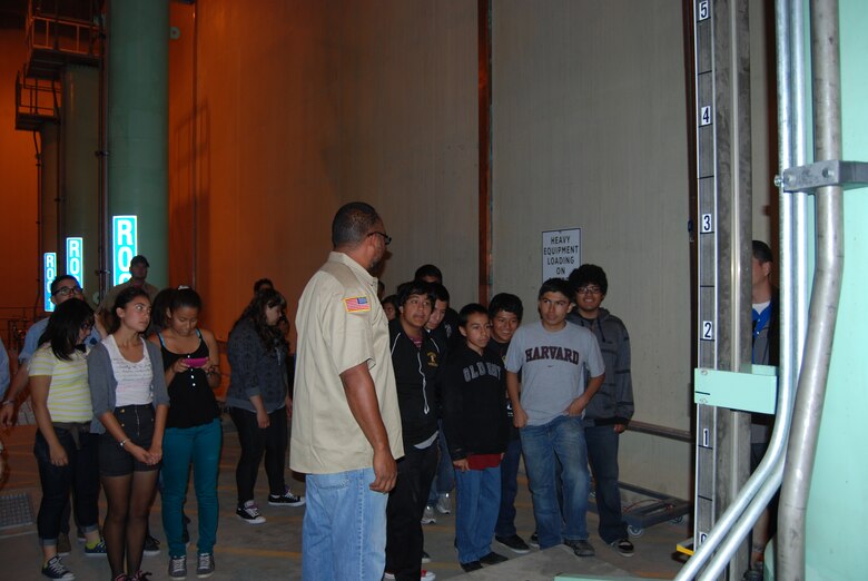 CORONA, Calif. — Lawrence Watkins, the dam tender at Prado Dam, gives math, science and technology students from Roosevelt High School a tour of the lower level of the dam's control tower, June 4, 2012.