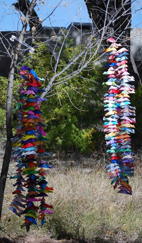 These colorful origami fish were hung in front of the Rio Grande Nature Center during the Middle Rio Grande Endangered Species Collaborative Program’s 10th anniversary celebration. The nature center provides opportunities for people to learn about the Rio Grande Bosque’s riparian forest ecosystem.  
