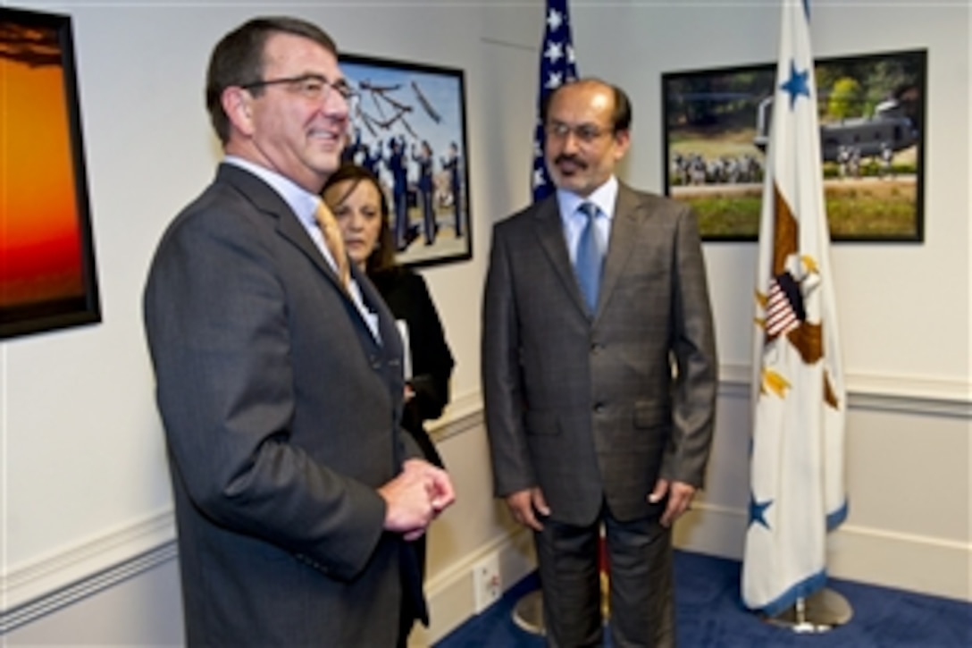 Deputy Defense Secretary Ashton B. Carter, left, introduces members of his staff as meets with Enayatullah Nazari, Afghanistan's first deputy defense minister, at the Pentagon, June 8, 2012.