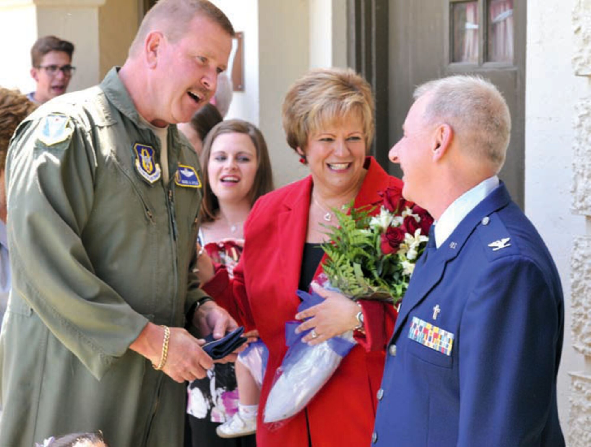 Maj. Gen. Mark Kyle, 4th Air Force commander, shares a laugh with newly promoted Col. Steve O’Brien, 4th AF chaplain, and his wife, Laurie, while in the receiving line after the ceremony at the Cultural Resource Center, March Air Reserve Base, Calif., on June 1. (U.S. Air Force photo by Maj. Andra Higgs)